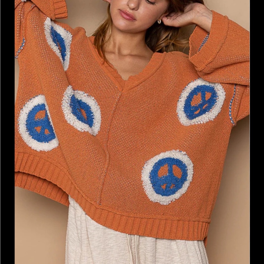 Peace of Mind V neck Women’s Orange Peace Sign Knit Sweater